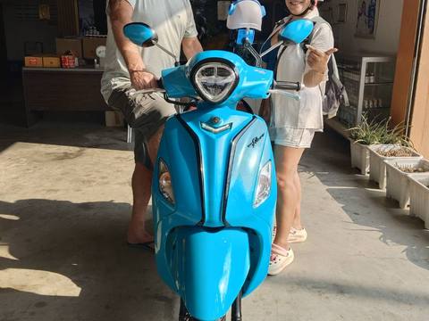Customer with rental scooter in Prachuap